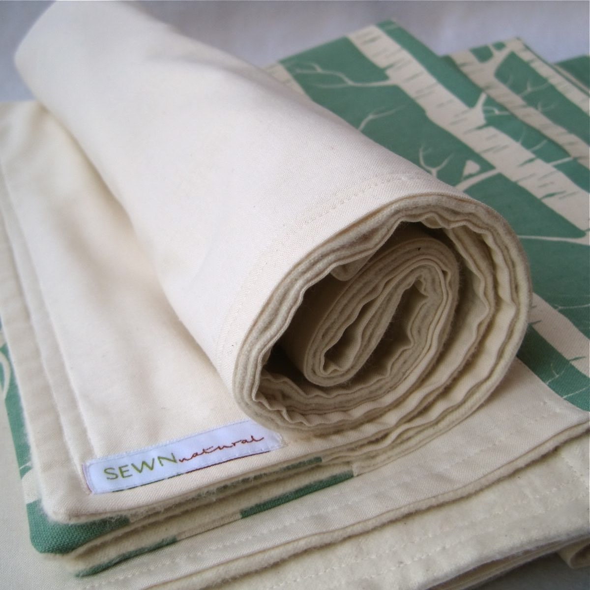 unisex organic baby blanket with eco friendly applique of blue