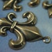 3pc fleur de lis charms antiqued gold over brass pendant drop