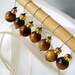 CLEARANCE - Scorpion Honey - Seven Snag Free Stitch Markers Set - Fits Up To 4.5 mm (8 US) - Open Edition