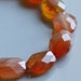 Carnelian Beads Faceted Oval 10mm x 7mm - 10 beads
