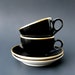 Demitasse Cup & Saucer Sets, Pair: Mid Century Mayer China, Glossy Black w/ Gold Trim
