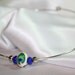 Lampworked Peacock Feather Cosmic (neck) Ring