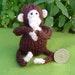 Tiny knitted monkey