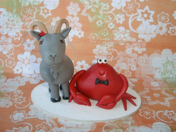 custom crab and goat cake topper reserved for lilyanag