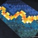 Wall Hanging - Swirling Colors Against a Dark Background