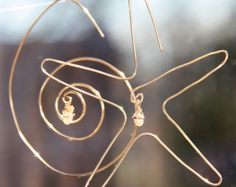 starfish and nautilus dangle earrings