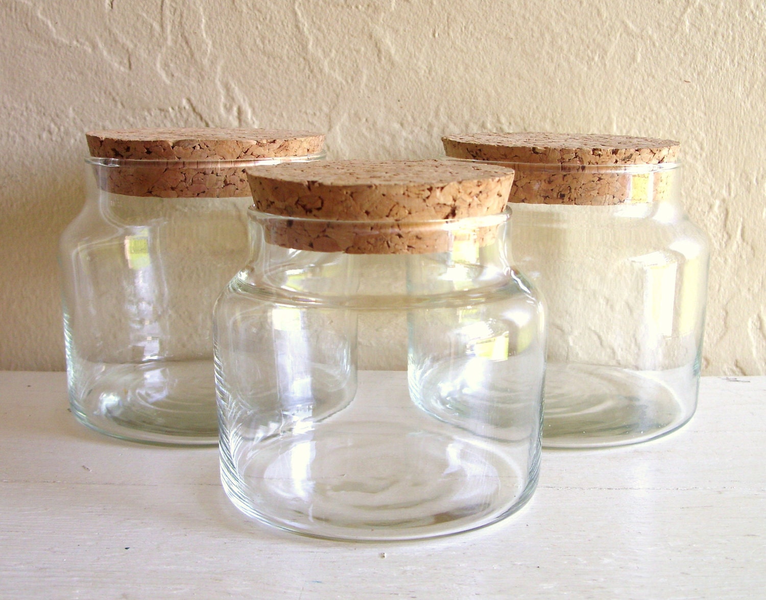 Three Matching Glass Apothecary Jars with Cork Lids