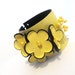 Yellow floral leather bracelet with pearls