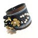Floral leather bracelet with flowers.