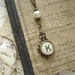 Typewriter Key Jewelry - Yellow Letter K Vintage Typewriter Key Necklace. Antiqued Brass with Ivory Glass Pearl. Salvaged Rustic Jewelry.