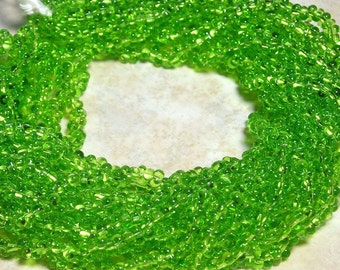 4x2mm Transparent Light Green Czech Glass Farfalle Seed Bead Strand (AW85)