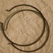 2 Vintaj Brass's creative bracelet hoops.