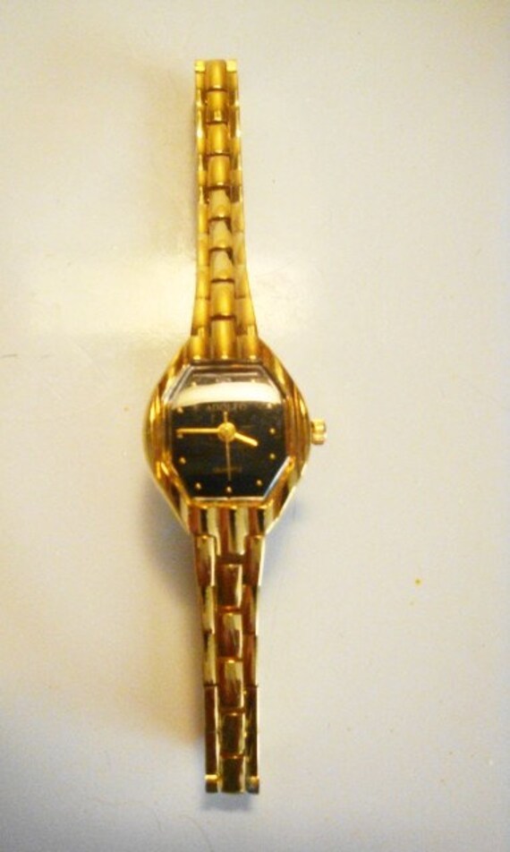 adolfo quartz watch