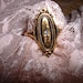 Vintage Avon Kensington Rhinestone Goldtone and black ring 8 1/2 adjustable