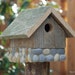Weathered Wood Birdhouse with Stone Foundation - 1 1/8 inch Entry