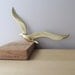 vintage brass seagull