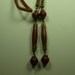 Vintage 1920s Necklace Flapper Bolo Glass Beads Ornate Brass Caps