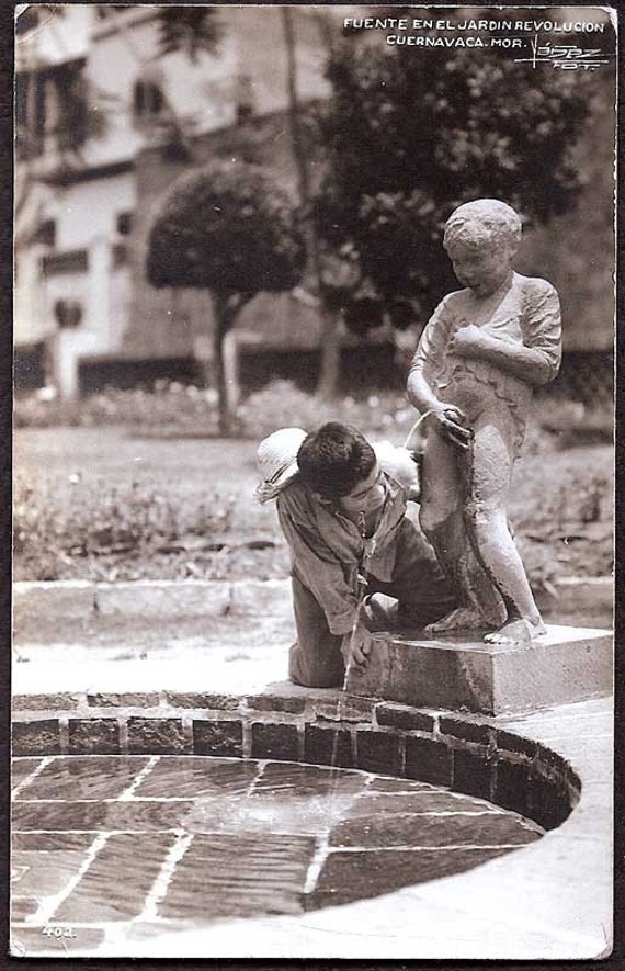 Boy Drinking From Peeing Water Fountain Cuernavaca Mexico