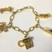 Very cool vinatge 80s heavy telephone charm bracelet with Princess Trimline Dial and rotary phones