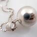 RESERVED for couturebunny - Vintage Sterling Silver Jingle Ball Pendant on Square Chain