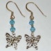 Swarovski Blue and gold Butterfly charm earring