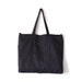 RIIA in black vegan suede