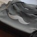mustache onesie