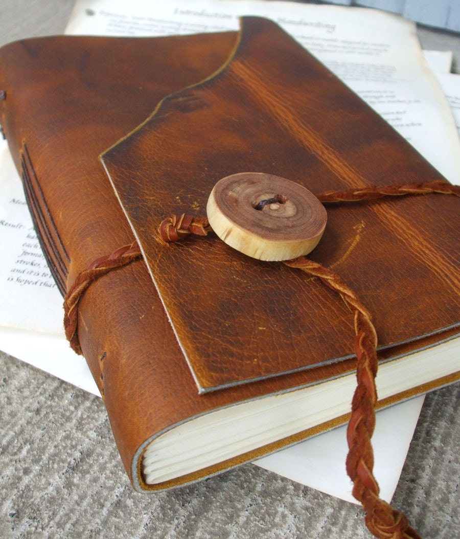 Handmade leather writing journal. mimosa wood button and