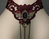 Gothic Choker: Dark Red Lace with Brass ornaments and a black stone. Steampunk Victorian Baroque