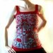 red and blue robot pixel mash-up tank