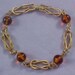 Avon - Topaz Orb Gilt Gold BRACELET