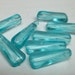 Ice blue 12x7 vintage oblong plastic bead