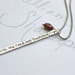reserved for the fabulous R . the road less travelled necklace . recycled silver and ruby necklace . recycled silver