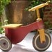 Folk Art Tricycle...in muted shades of Yellow, Red and Black....Soooooo Cute