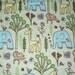 One Yard Of Jungle Animals Fabric On A Green Background