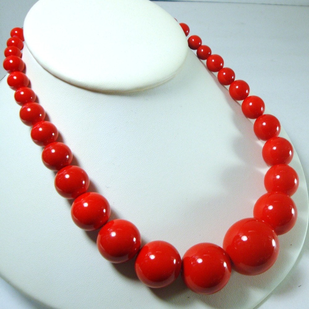 red plastic bead necklace