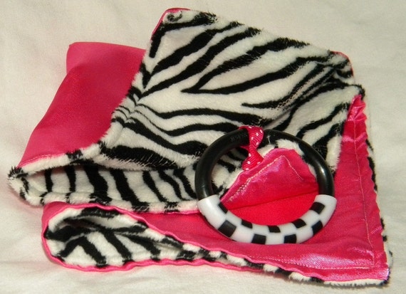 Items similar to Zebra Minky and Pink Satin Blanket on Etsy