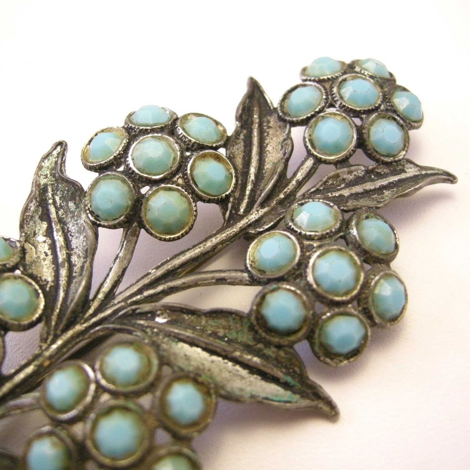 Vintage silver pot metal flower brooch with turquoise glass