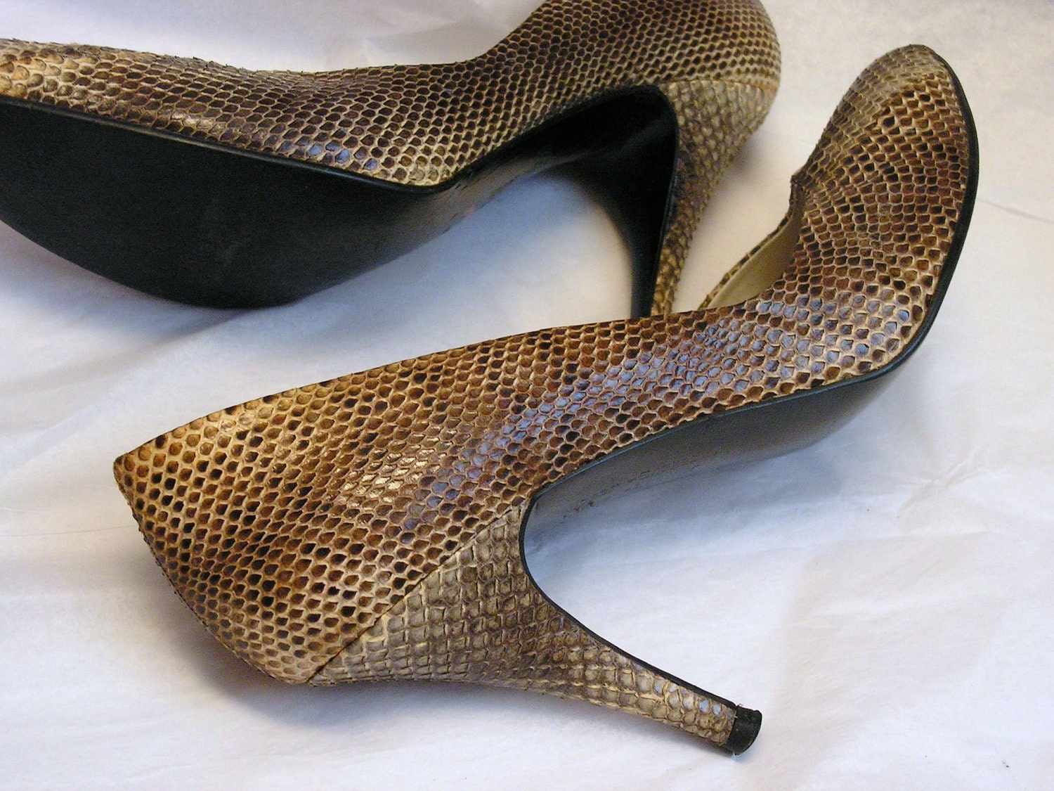 snakeskin flat pumps