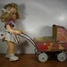 Adorable Lithographed Metal Toy Baby Buggy with Cats and Dogs