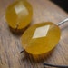 niobium earrings in yellow agate. tangerine earrings. hypoallergenic earrings. modern earrings. splurge
