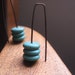 niobium earrings in turquoise howlite. turquoise earrings in chocolate niobium. splurge.