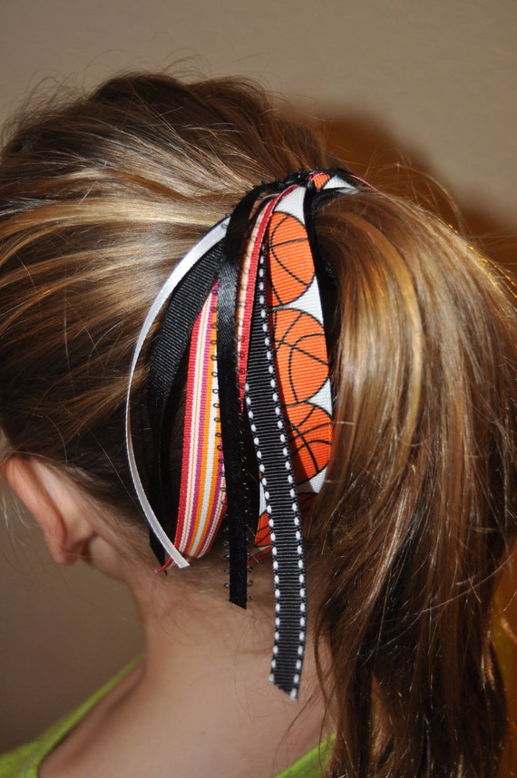 Items similar to Basketball hair tie pony tail orange and black bow