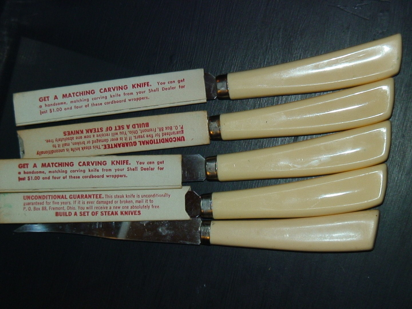 Set of quikut steak knife set with original paper covers