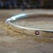 bangle bracelet silver: twisted sterling silver bangle with gypsy set pink tourmaline
