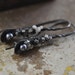 Black and white diamond and pearl teardrop earrings in oxidized sterling silver