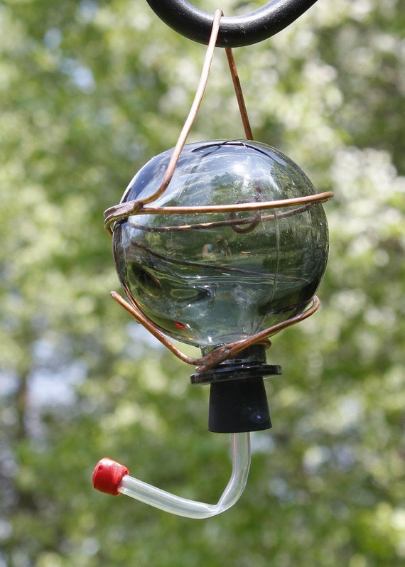 hummingbird feeder made from recycled smoke colored bottle hummingbird feeder made from recycled smoke colored bottle