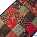 Quilted Table Runner Dominique II Black, Browns, Reds
