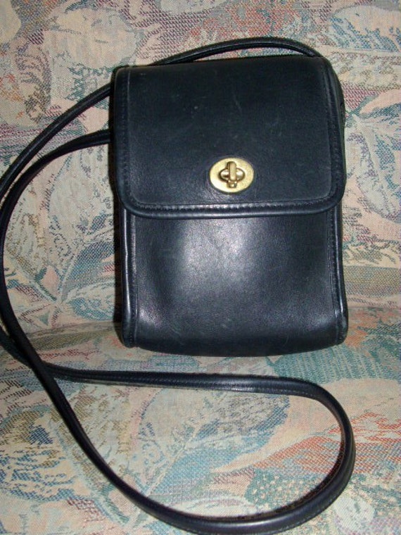 Small black leather Coach bag with cross body strap