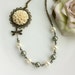 A Dragonfly's Whisper - An Ivory Cream Mum Dahlia Flower, Dragonfly, Swarovski Ivory and Matte Soft Green Glass Pearl Necklace. For Mom.